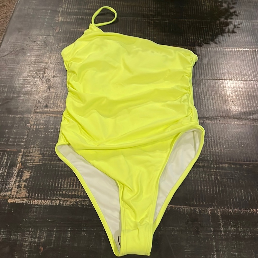 Women’s medium one piece, yellow neon swimsuit, new without tags